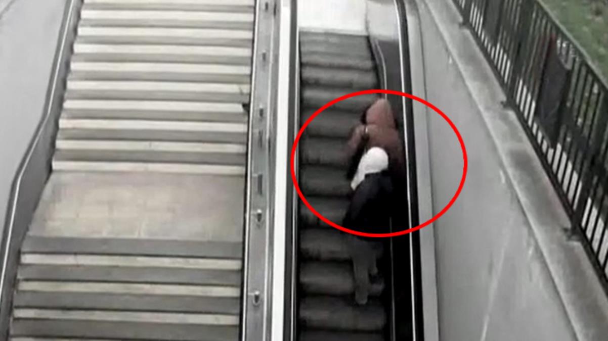 Hamile kadını yürüyen merdivende taciz etti