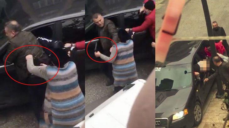 Yürekleri ağızlara getiren an! Polisin belindeki silahı aldı